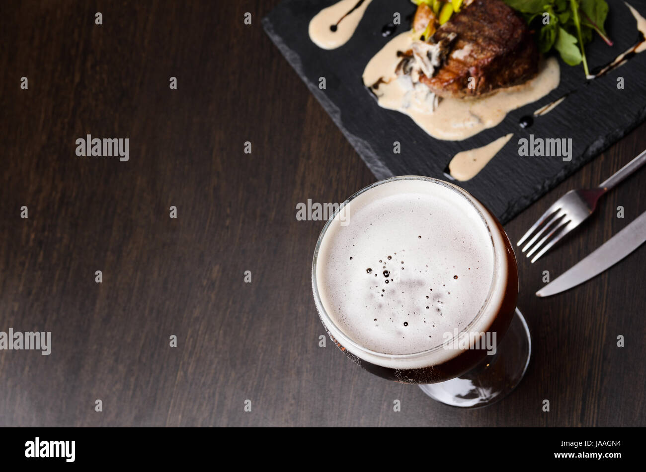 Beer glass and steak Stock Photo Alamy
