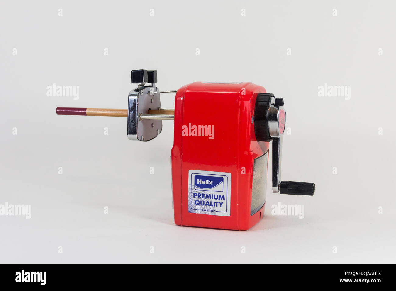 Deskmounted type pencil sharpening machine by Helix, with pencil. Isolated on white Stock Photo