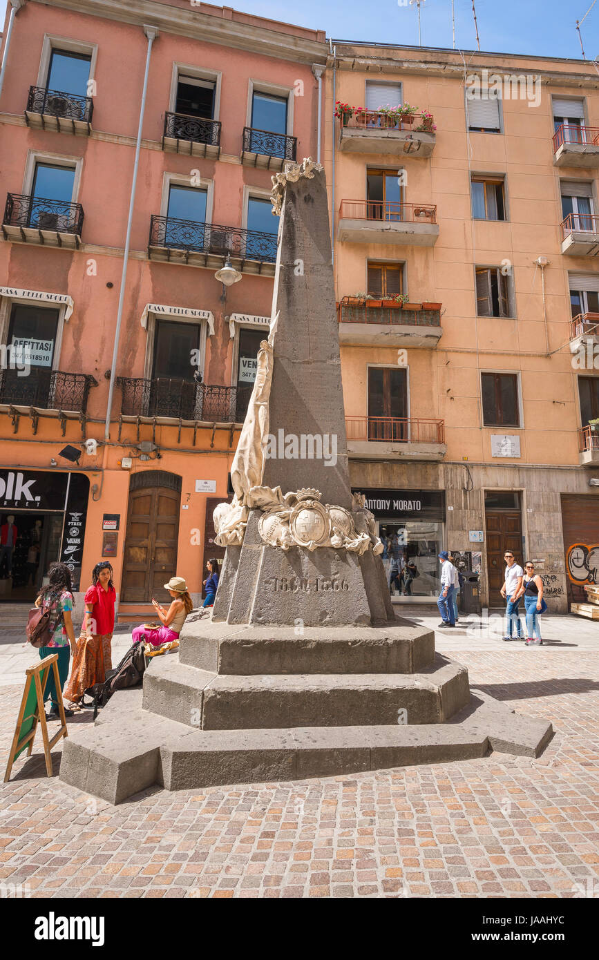 Cagliari Sardinia center, obelisk in the centre of the Piazza Martiri d'Italia in Cagliari honouring Sardinians who died for the Unification of Italy. Stock Photo