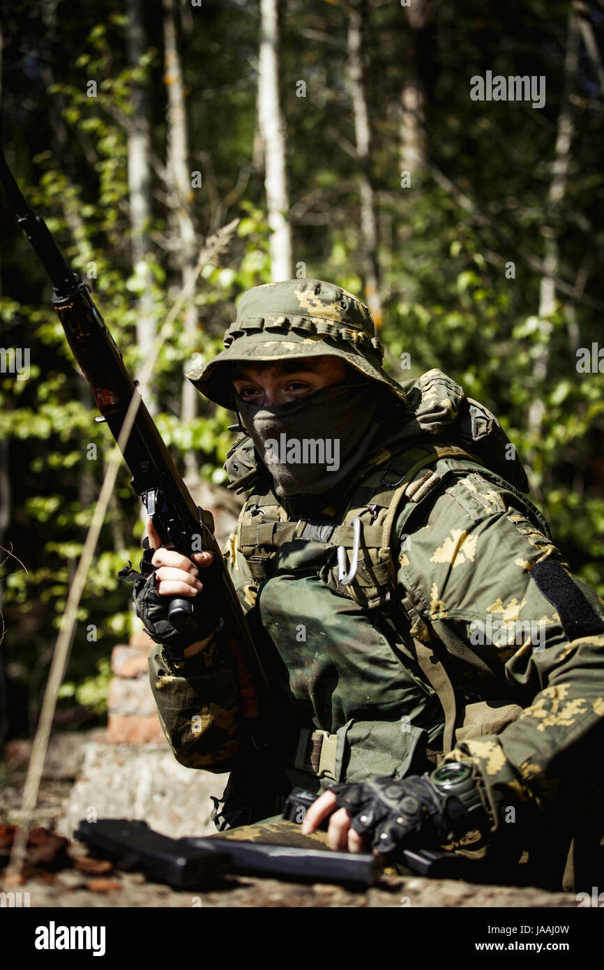Portrait of soldier in uniforms Stock Photo - Alamy