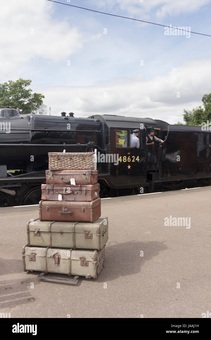 Stanier class 8F steam engine in British Railways black with it BR number 48624, at Quorn and Woodhouse railway station on the Great Central Railway.  Stock Photo