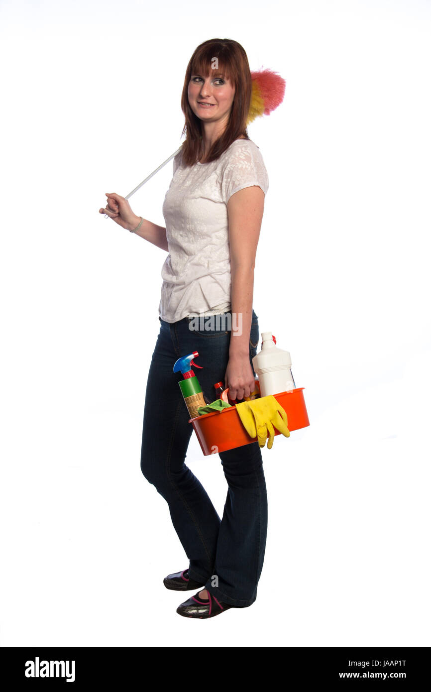 Young woman with a duster and other cleaning materials isolated on white background Stock Photo