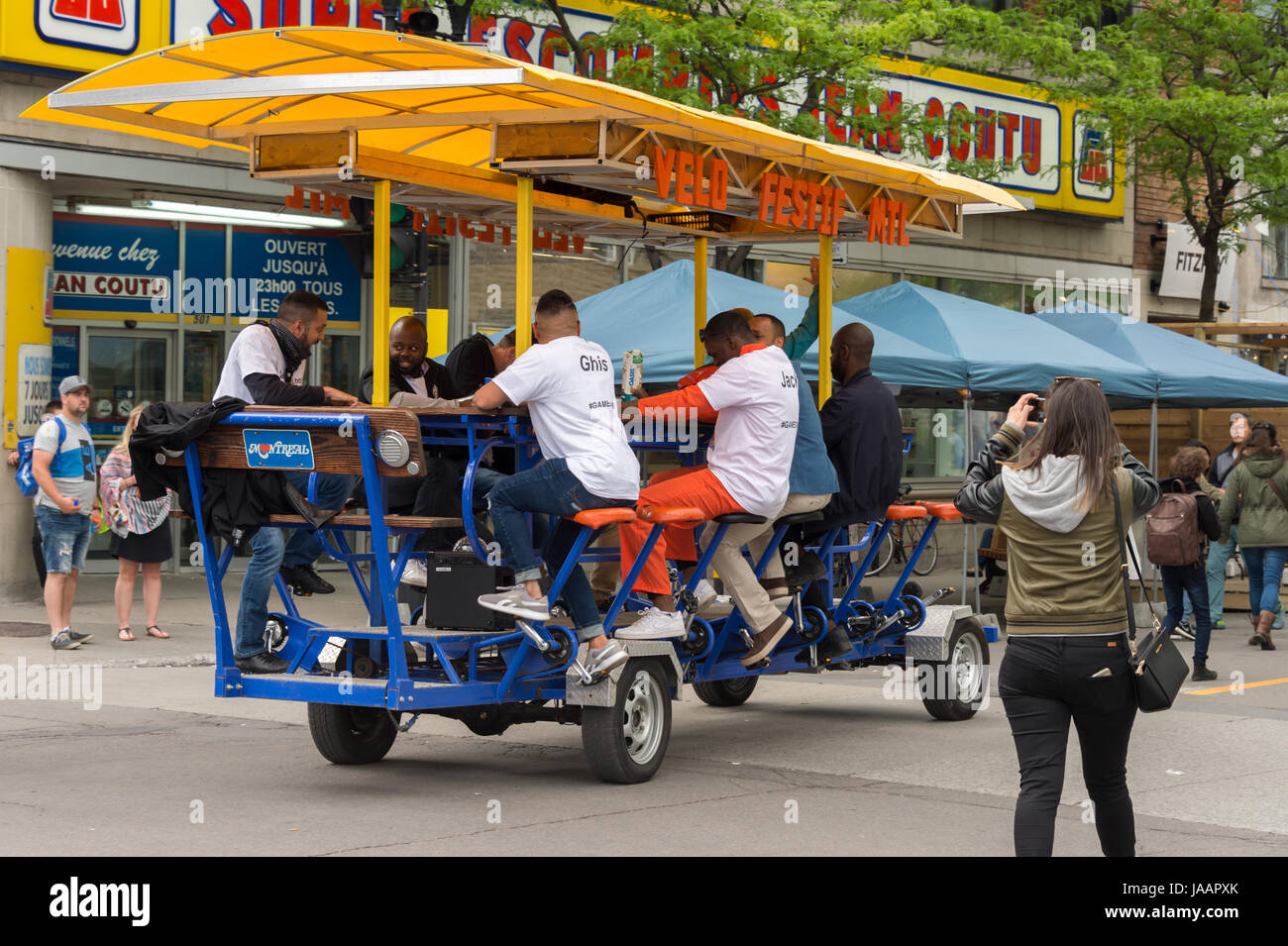 Montreal, Canada - 03 June 2017: People on 'Velo Festif' party bike in the Plateau Stock Photo