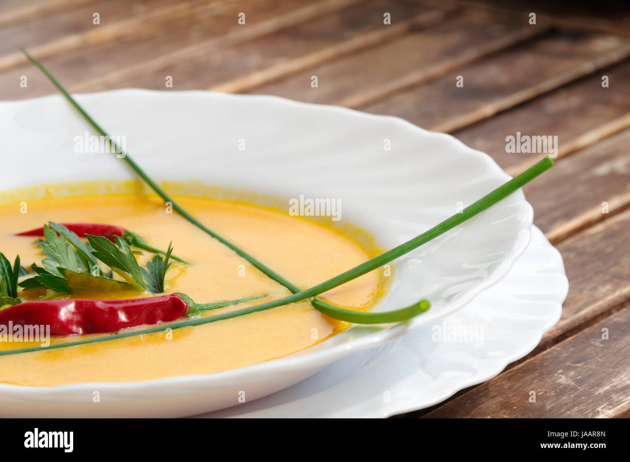 Kuerbissuppe mit Ingwer und Kokosmilch. Stock Photo