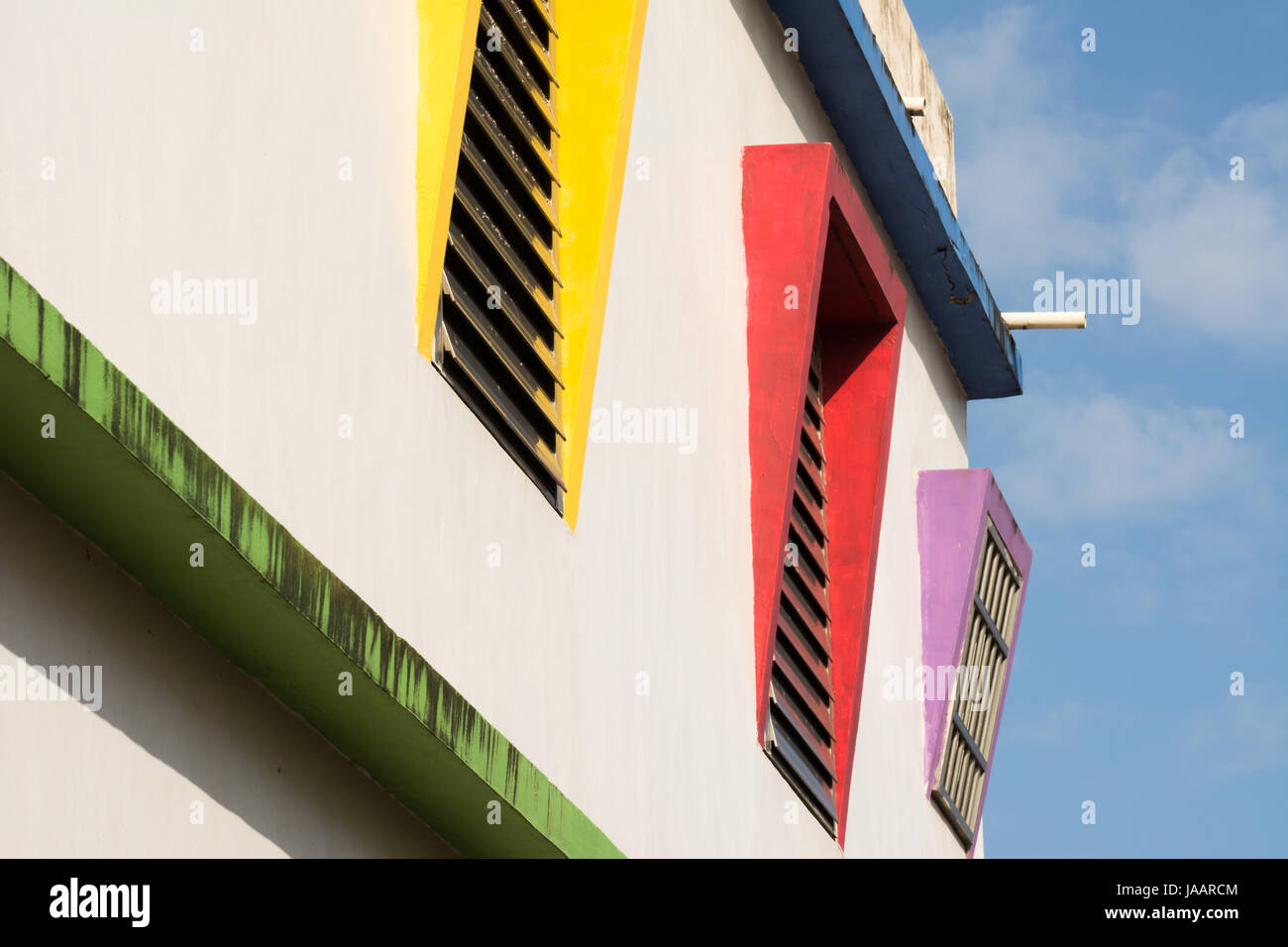 Colorful house iin abstract under blue sky Stock Photo - Alamy