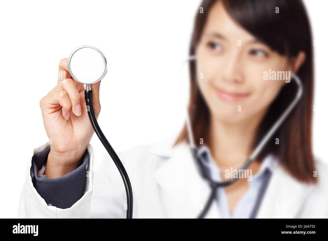Asian young female doctor holding a stethoscope Stock Photo - Alamy