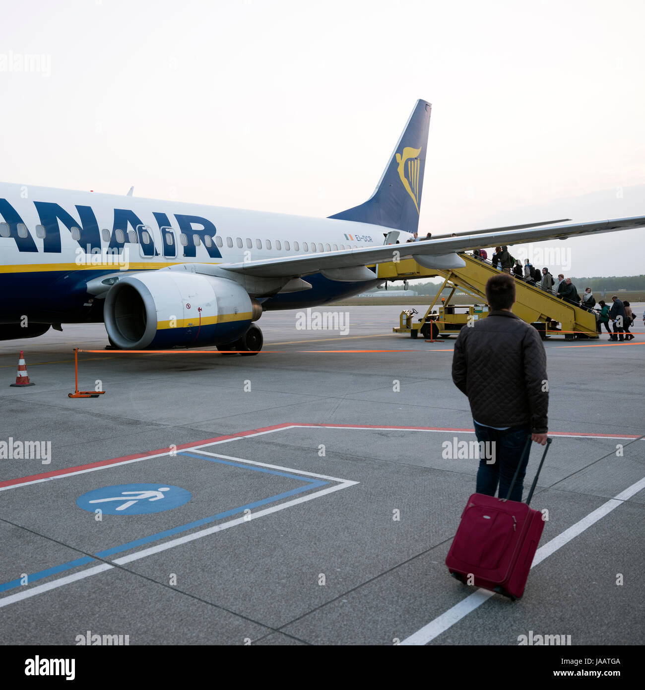 Eindhoven, Netherlands, 5 may 2017: passengers board ryanair airplane on eindhoven airport in the netherlands Stock Photo