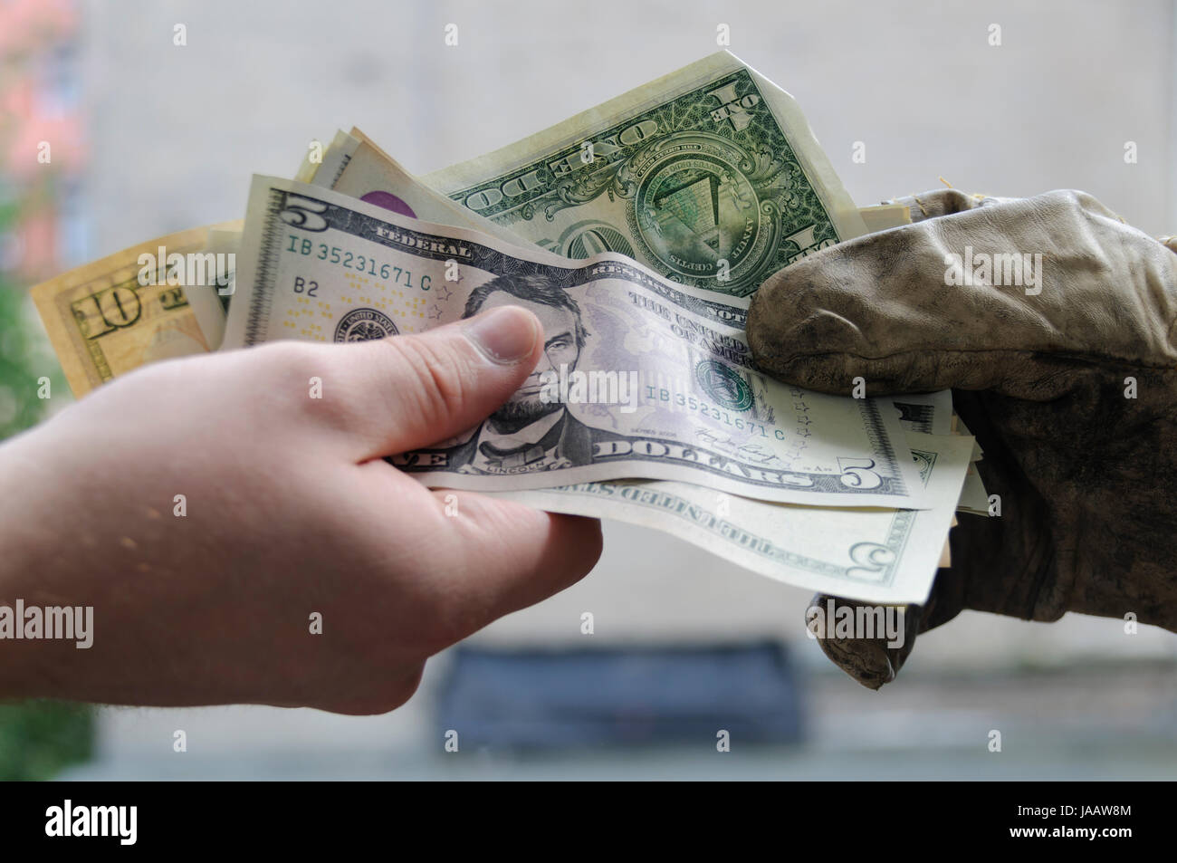 Hintergrund, Symbol als Bezahlung der Arbeit mit Dollar. Stock Photo