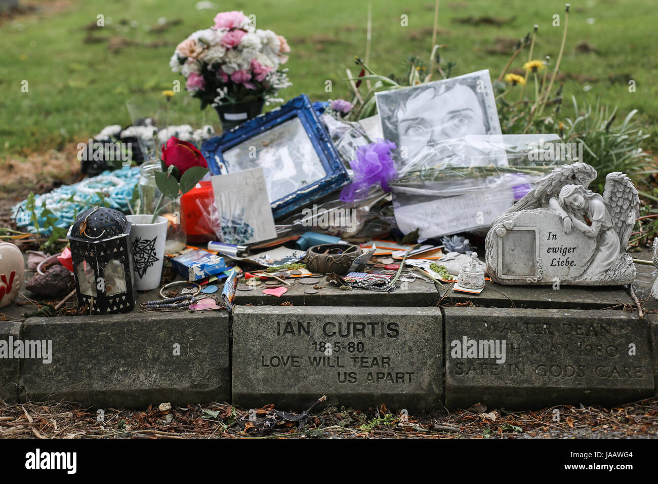 Ian Curtis' memorial stone at  Macclesfield Crematorium in Macclesfield, Cheshire, UK. The English singer-songwriter and musician was best known as th Stock Photo