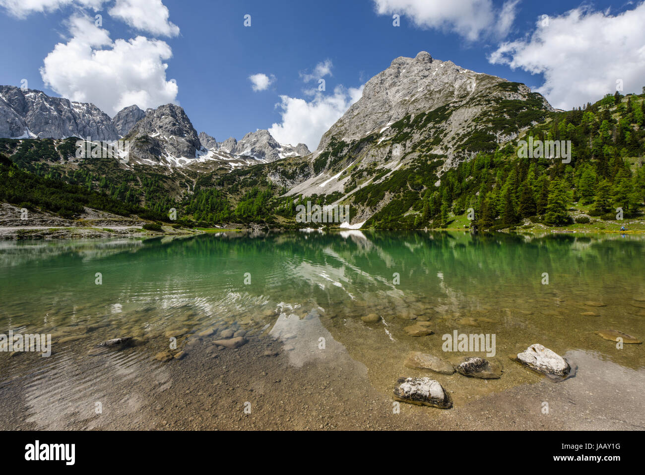 Scenic lake Seebensee  with reflections in the turquoise water, Ehrwald, Tyrol, Austria, Europe Stock Photo