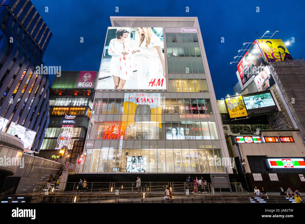 Dotonbori, Osaka. Night time, H&M fashion store building on waterfront ...
