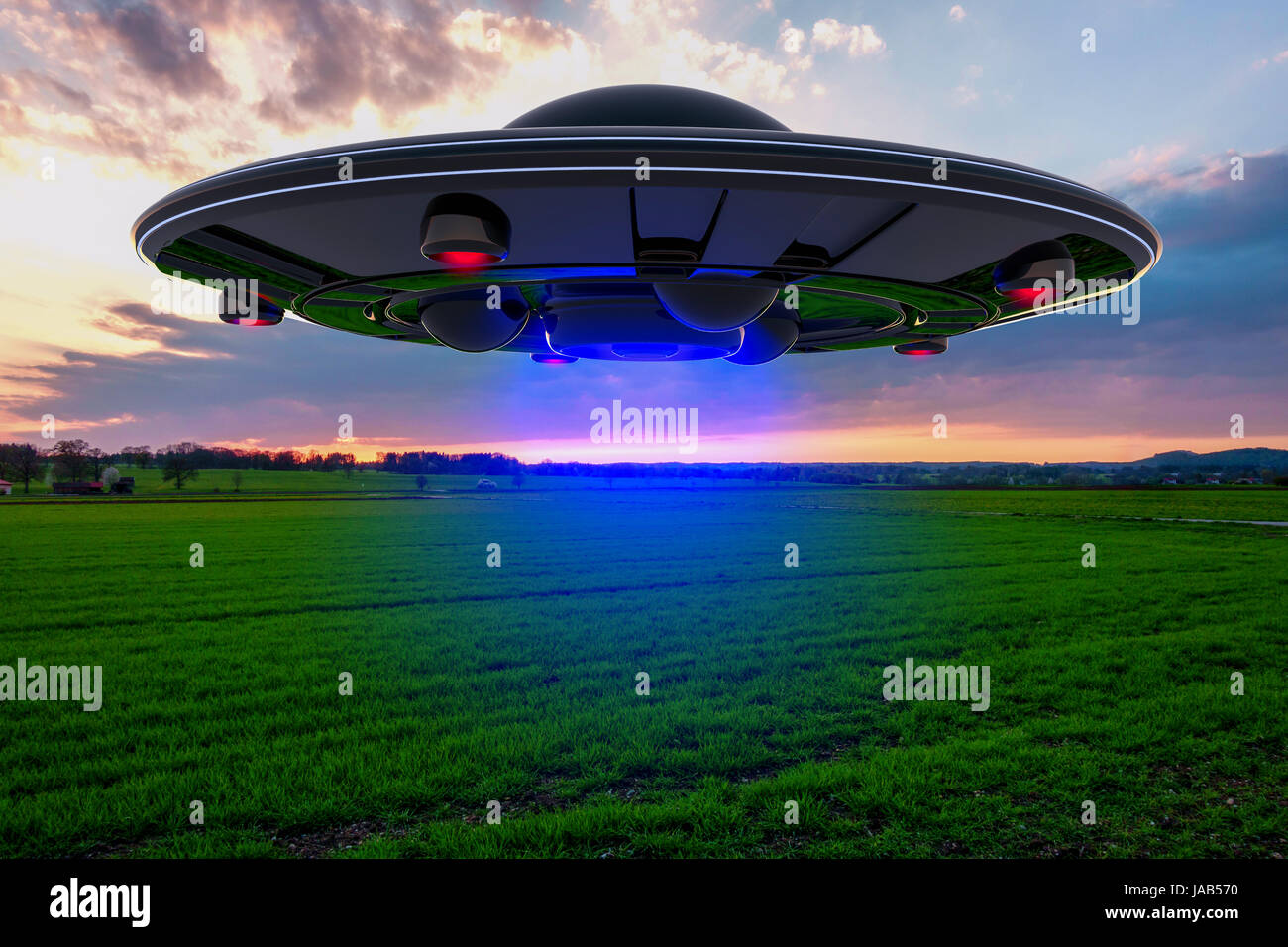 An unidentified flying object floats over the ground Stock Photo Alamy