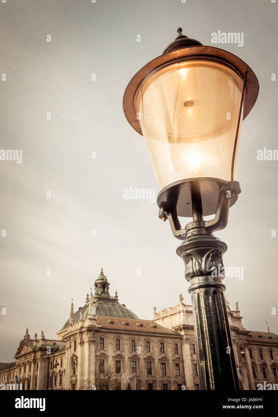 An old fashioned street lamp overlooking the ice skating rink and