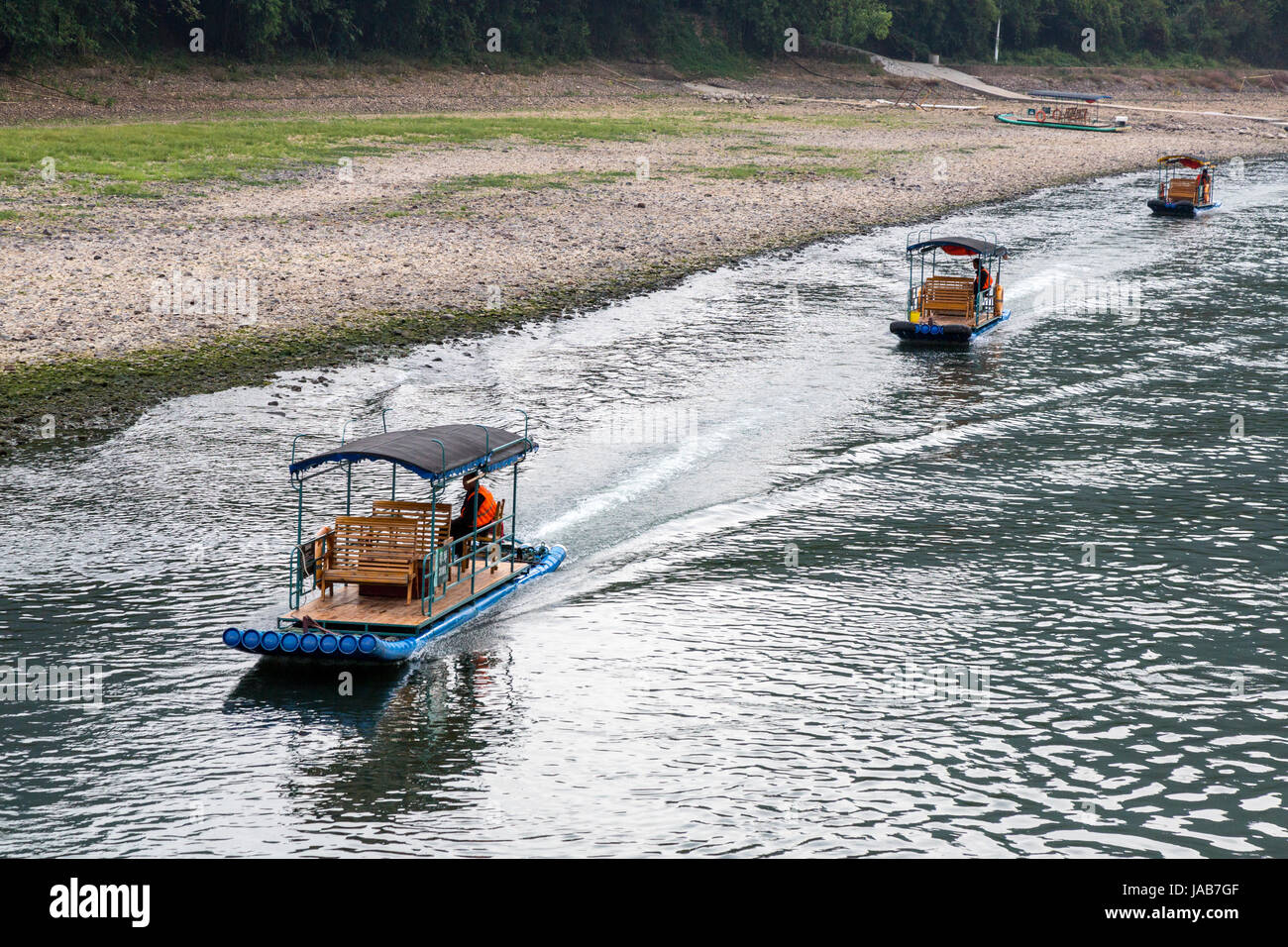 Li River Cruise, Guangxi Region, China.  River Taxis Going Upriver. Stock Photo