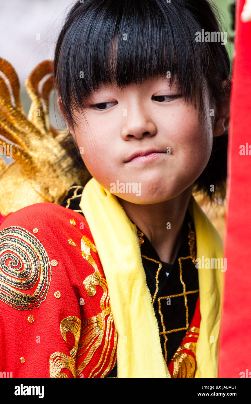 lowteen japanese Japanese, Asian child, girl, 6-7 years old, head and shoulders view,  looking coy, bored as she considers something Stock Photo - Alamy