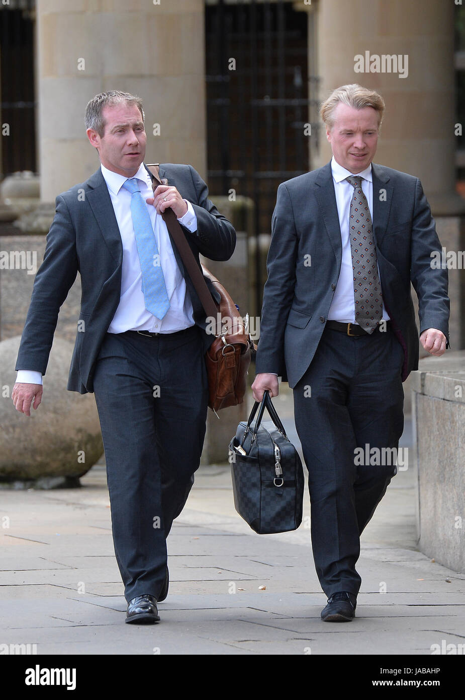 Lawyer Paul Kavanagh (left) and Craig Whyte (right) leaving Glasgow