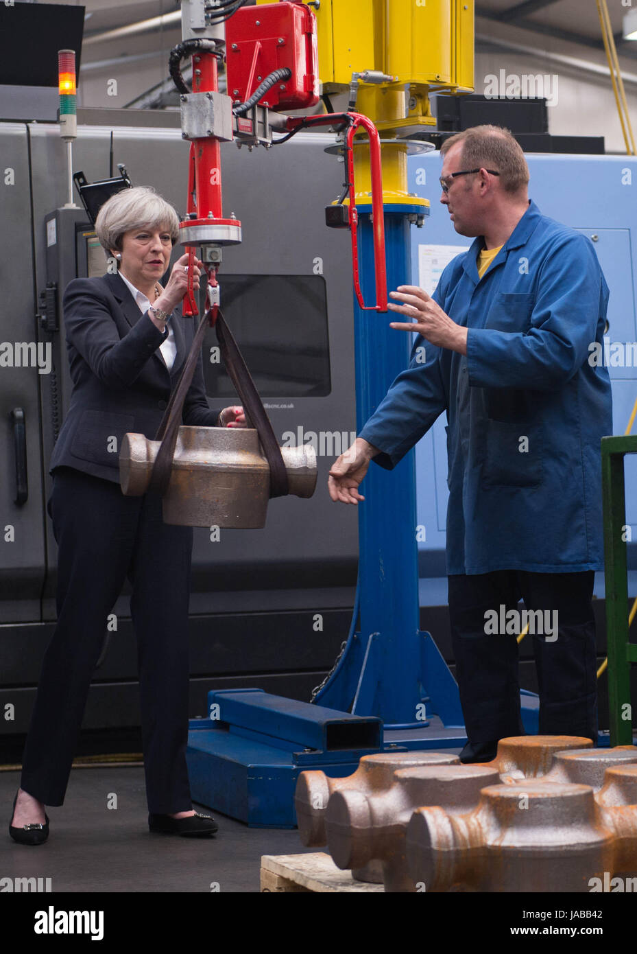 Prime Minister Theresa May meets staff and is shown around Abbey Tool