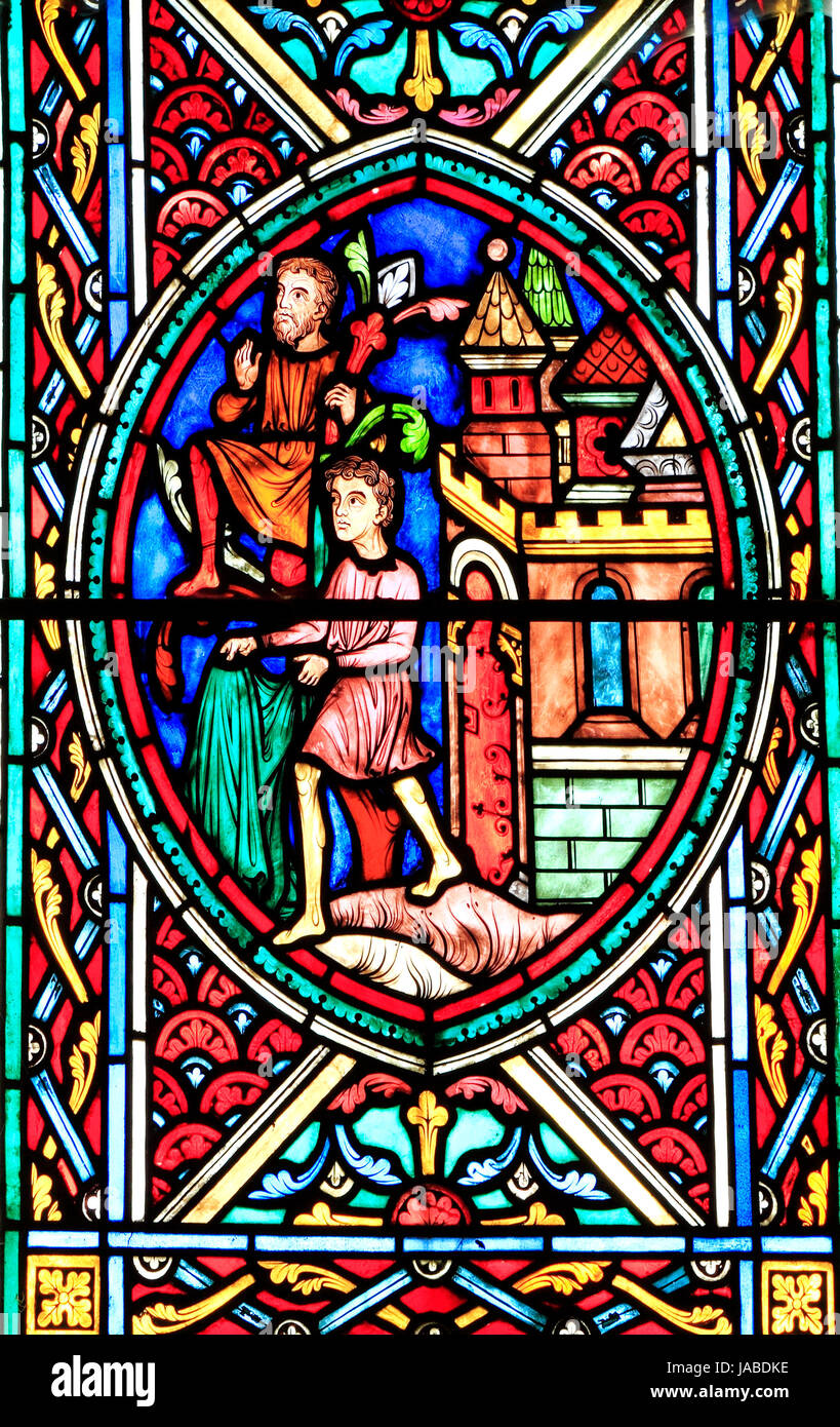 Jesus welcomed in Jerusalem, on Palm Sunday, people spreading coats before him, cutting palms, The passion Window by Adolph Didron of Paris, 1860 Stock Photo