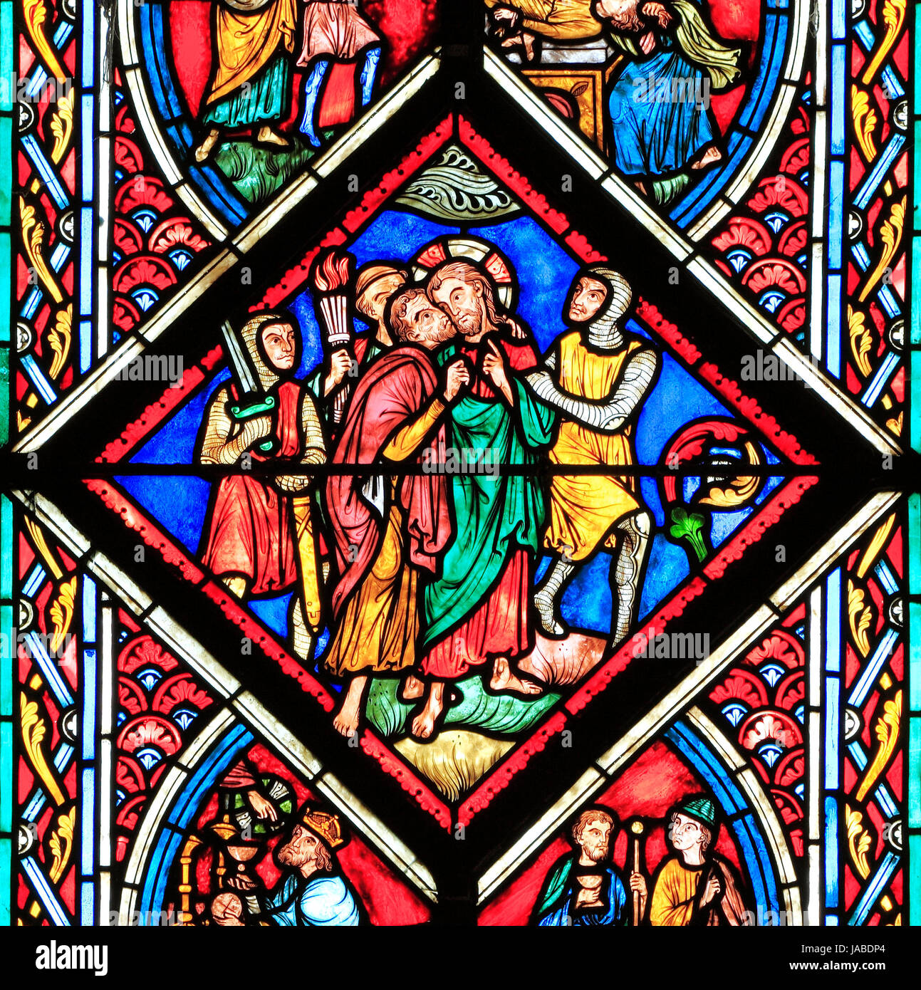 Judas betrays Jesus, with a kiss, in the Garden of Gethsemane, stained glass by Didron of Paris, 1860, Feltwell, Norfolk, detail Stock Photo