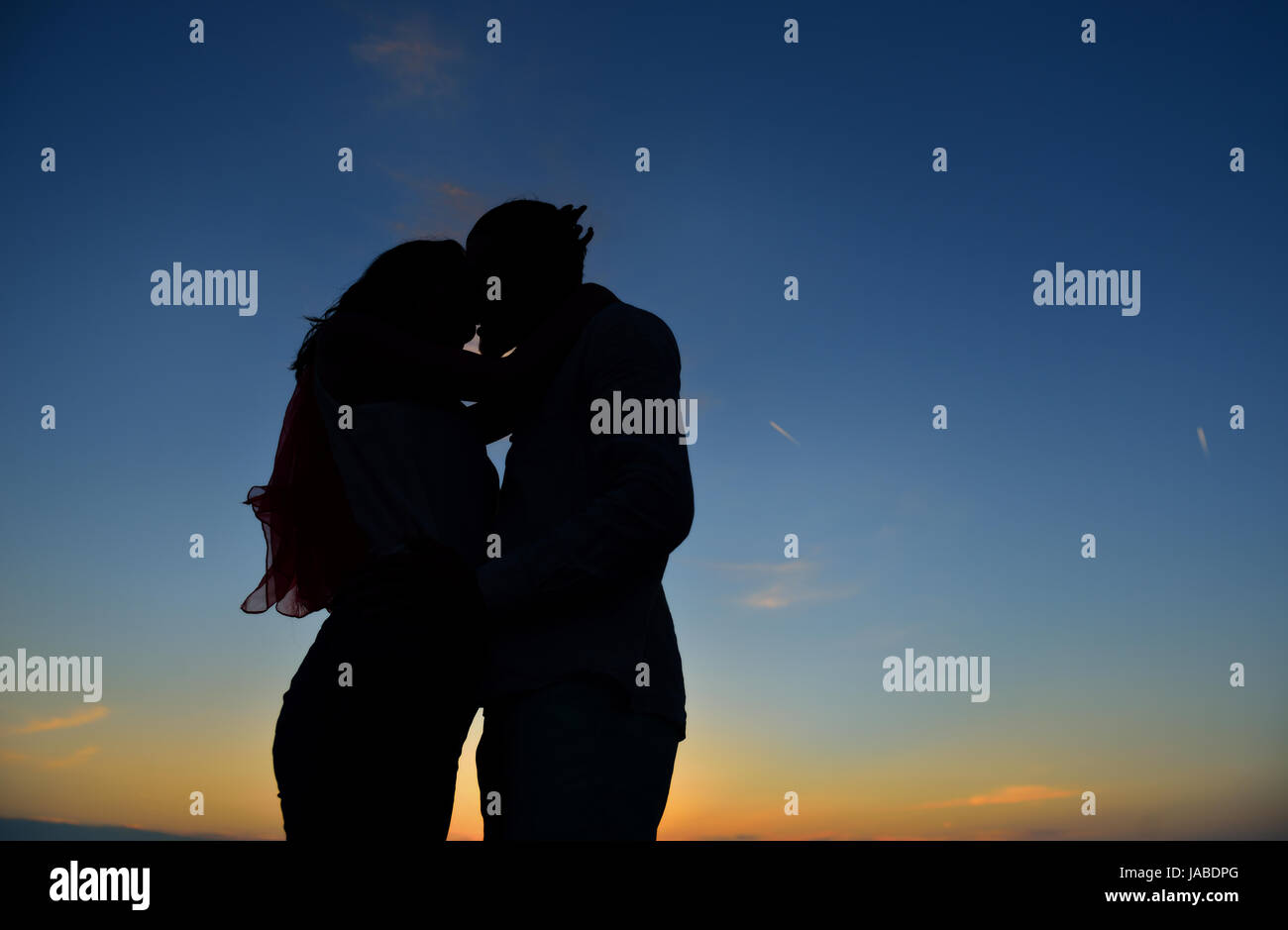 Silhouette of Lovely Couple at the beach Stock Photo - Alamy