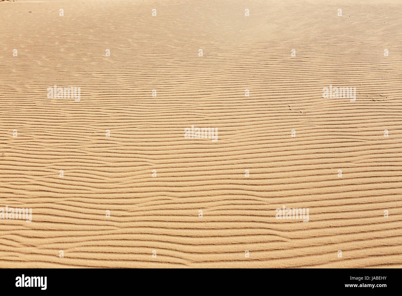 Lines in the sand of a beach, close up Stock Photo - Alamy