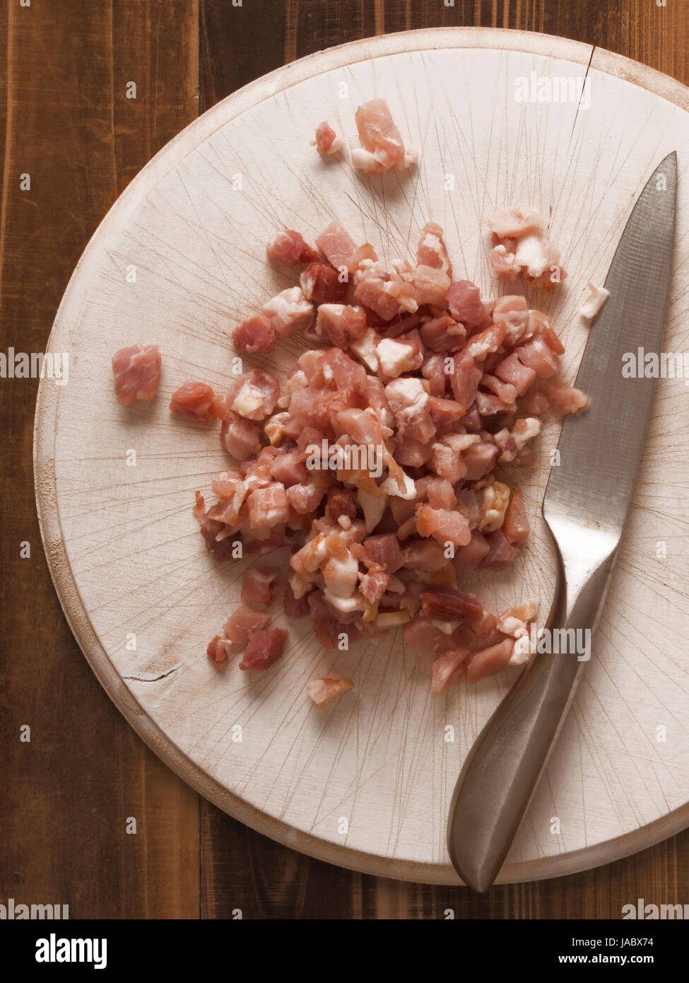 close up of uncooked bacon bits Stock Photo