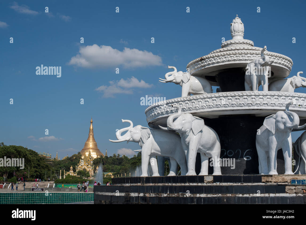 An ornament of elephants stands in the pathway leading to the Shwedagon Pagoda in Yangon (Rangoon), Myanmar (Burma) Stock Photo