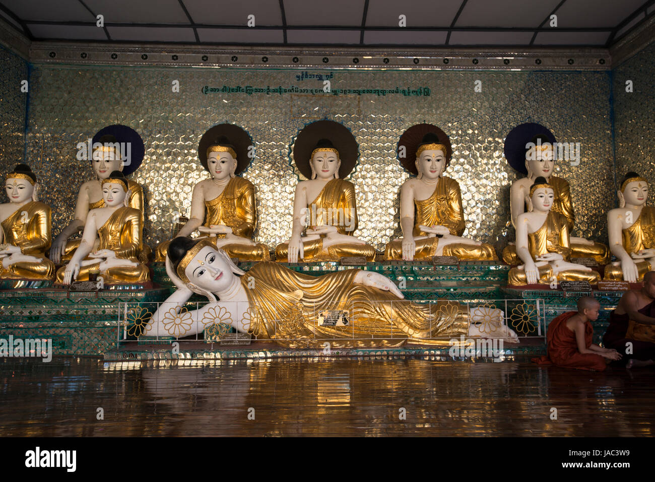 A shrine displays a reclining Buddha at the Shwedagon Pagoda in Yangon (Rangoon), Myanmar (Burma) Stock Photo