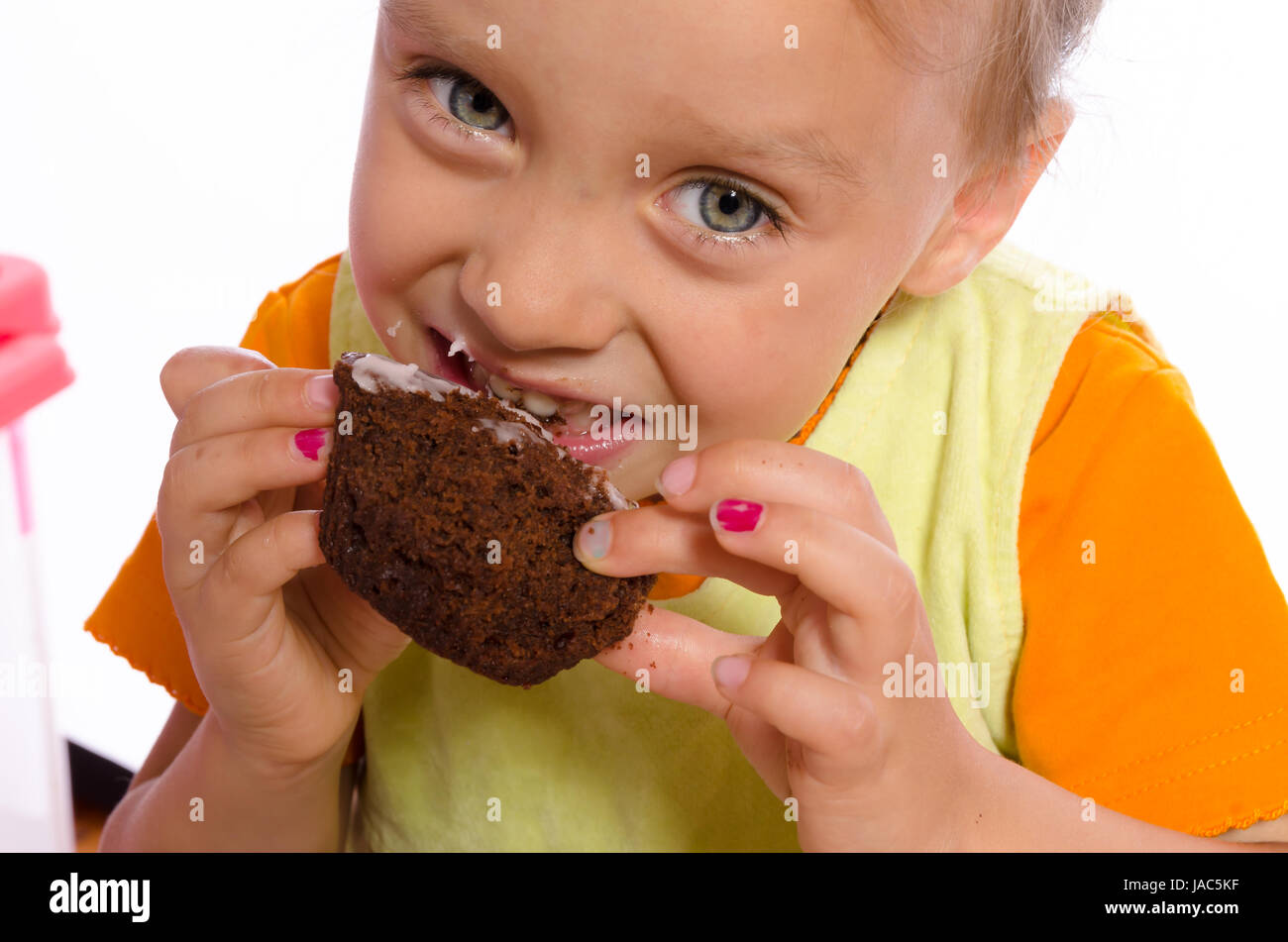 small girls and muffin Stock Photo