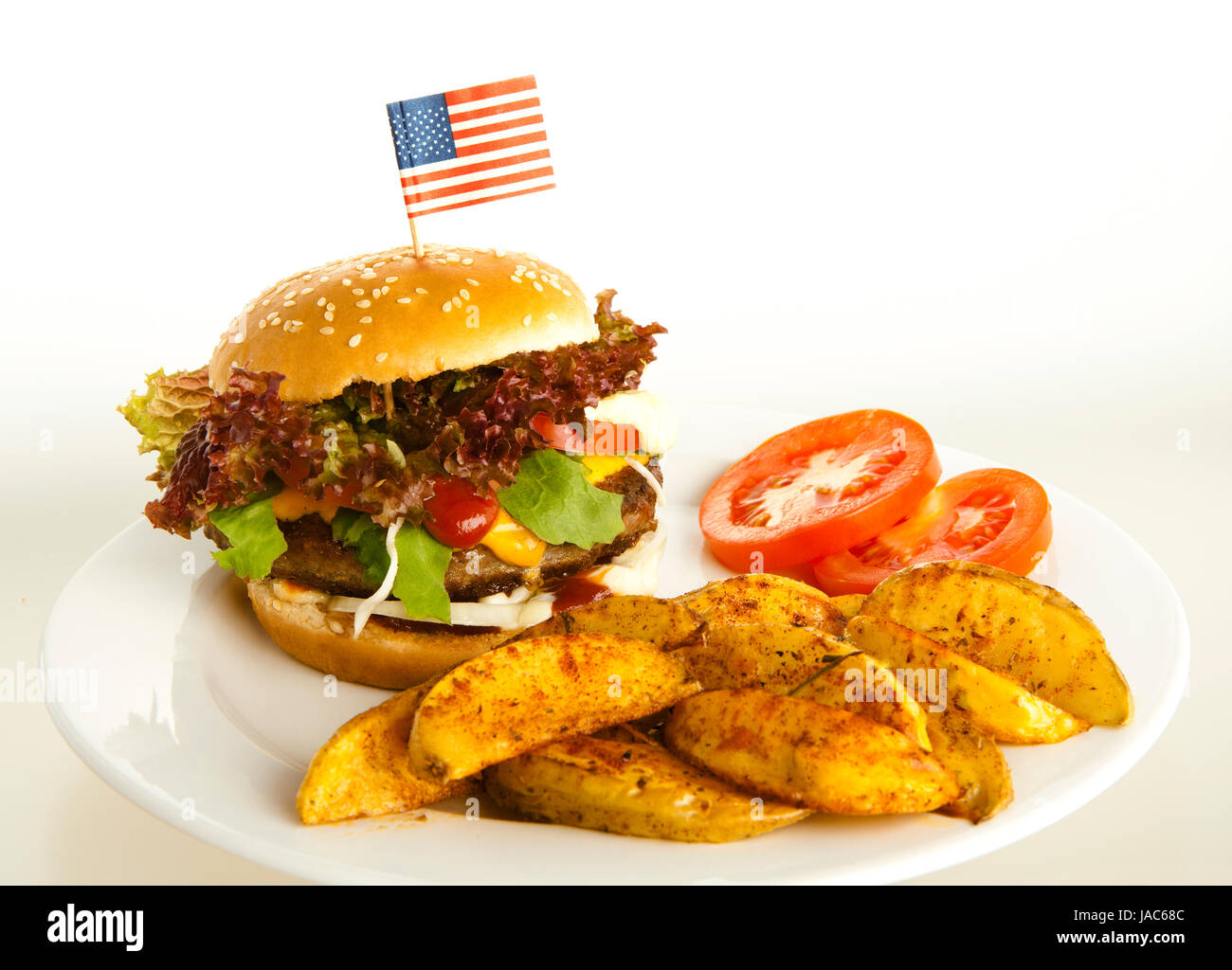 Burger With Potato Wedges On Plate Background White Tomatoes As