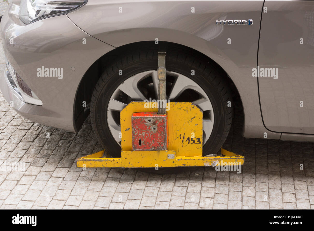 Visitors driving to Prague need to be careful to park correctly. Clamped cars near the National Museum Stock Photo