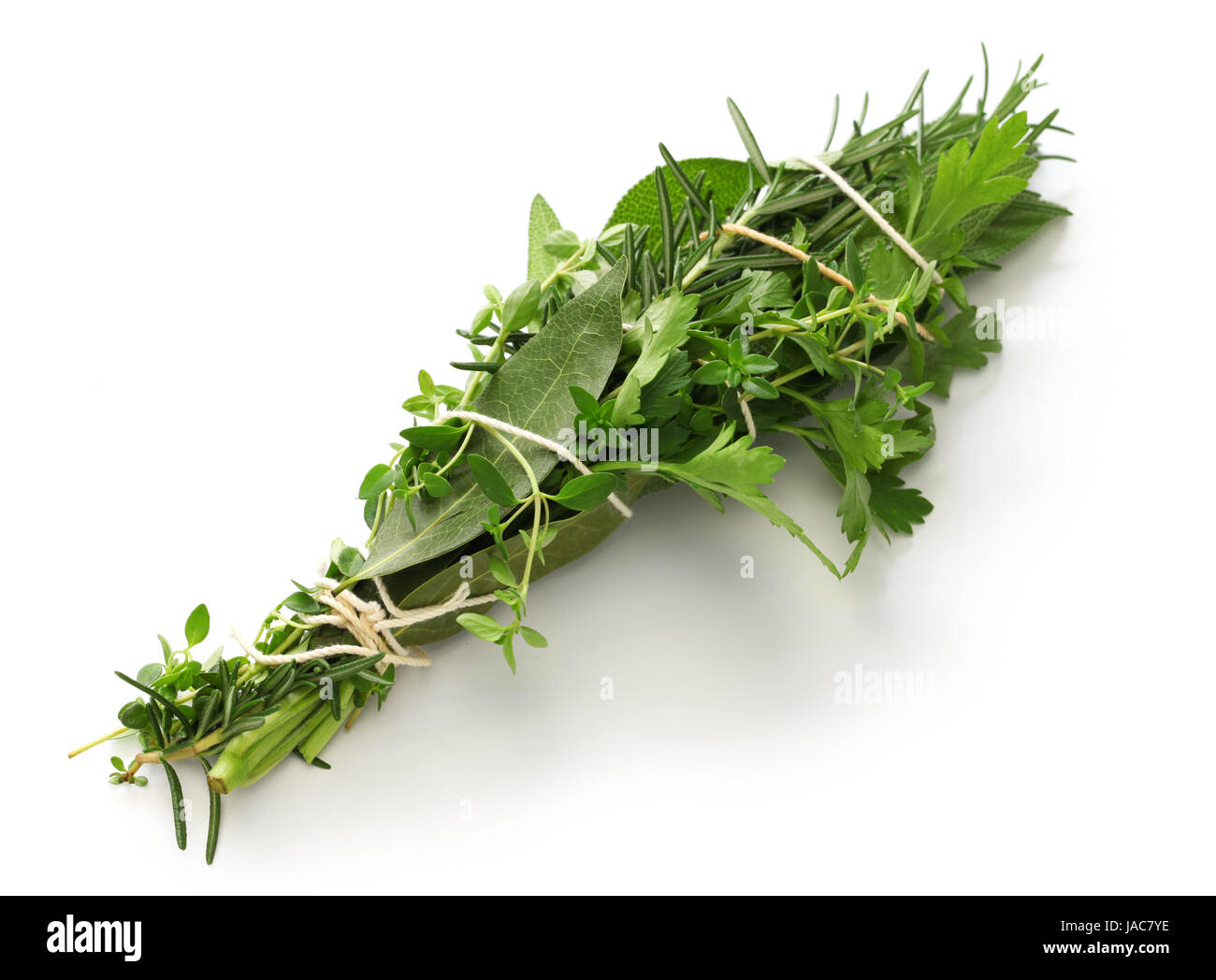 fresh bouquet garni, bunch of herbs isolated on white background Stock