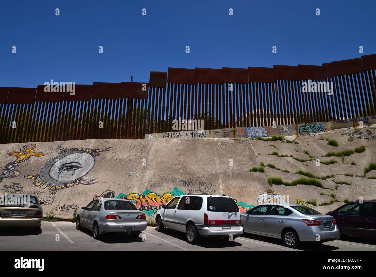 A wall indicates the international border with Nogales, Arizona, USA, as seen from Nogales, Sonora, Mexico. Stock Photo