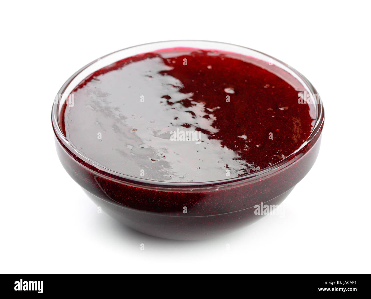 Bowl of homemade black currant jam isolated on white Stock Photo