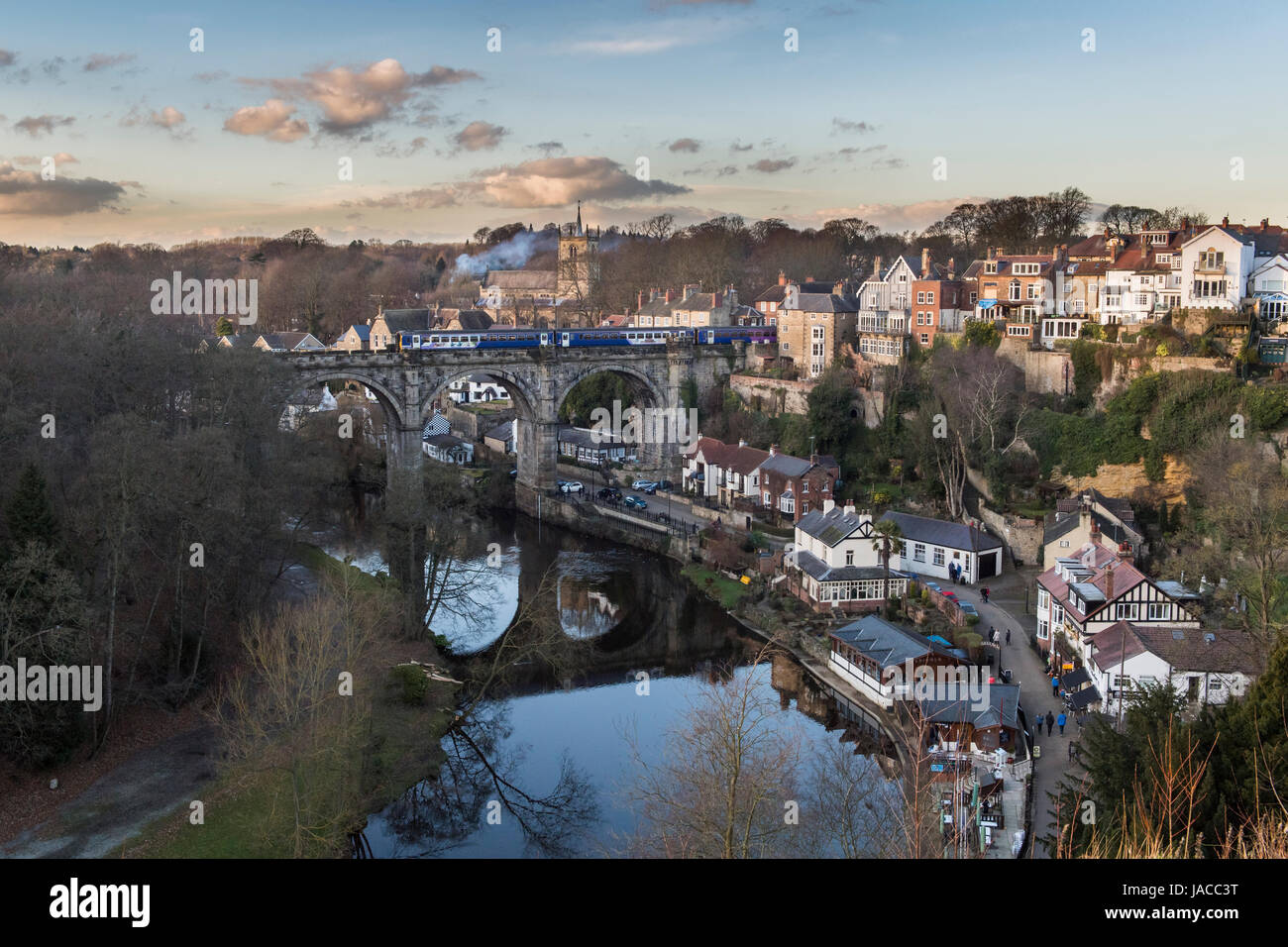 Scenic Knaresborough & River Nidd (passenger rail service, viaduct spanning gorge, strolling by riverside, hillside buildings) - Yorkshire England UK. Stock Photo