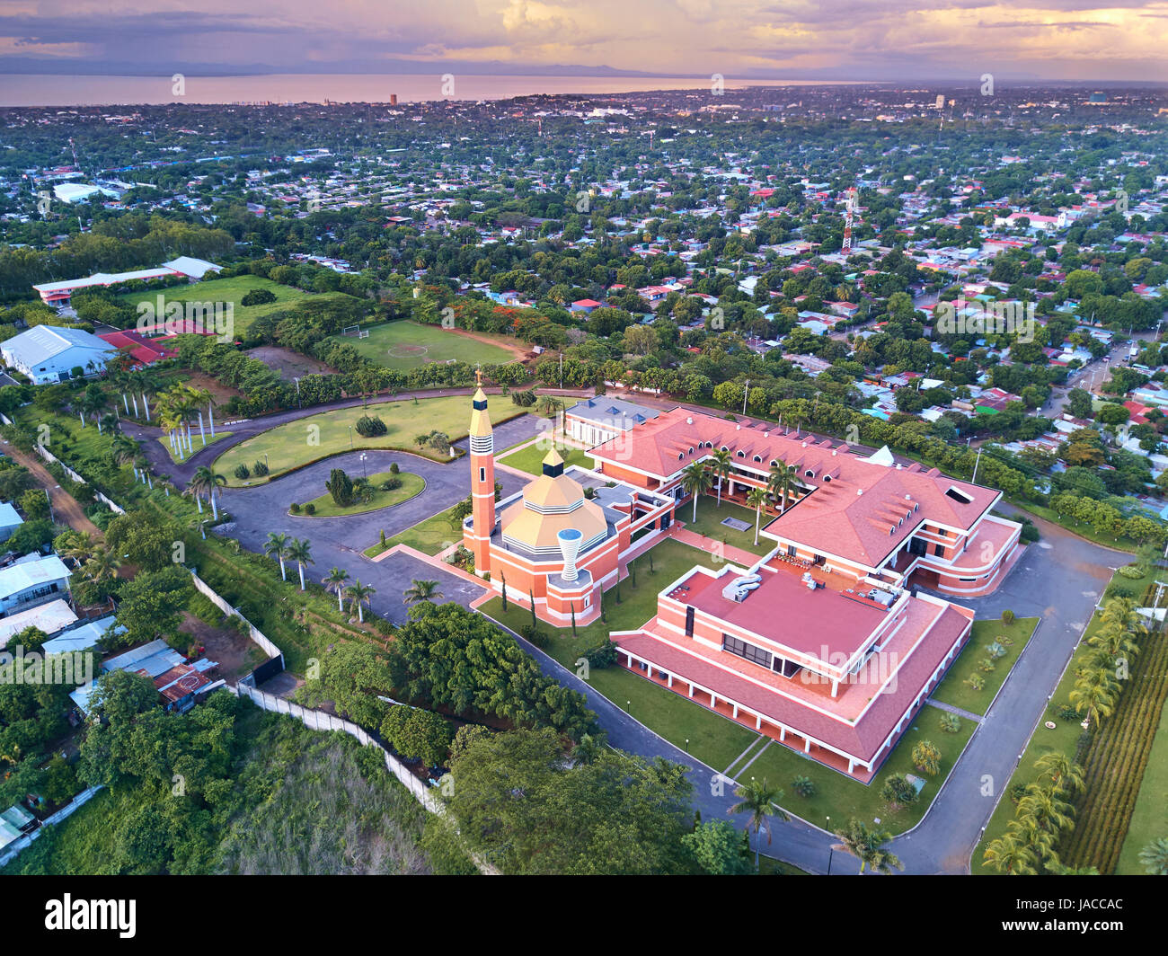 Cityscape of Managua city in Nicaragua at dusk time aerial view Stock Photo