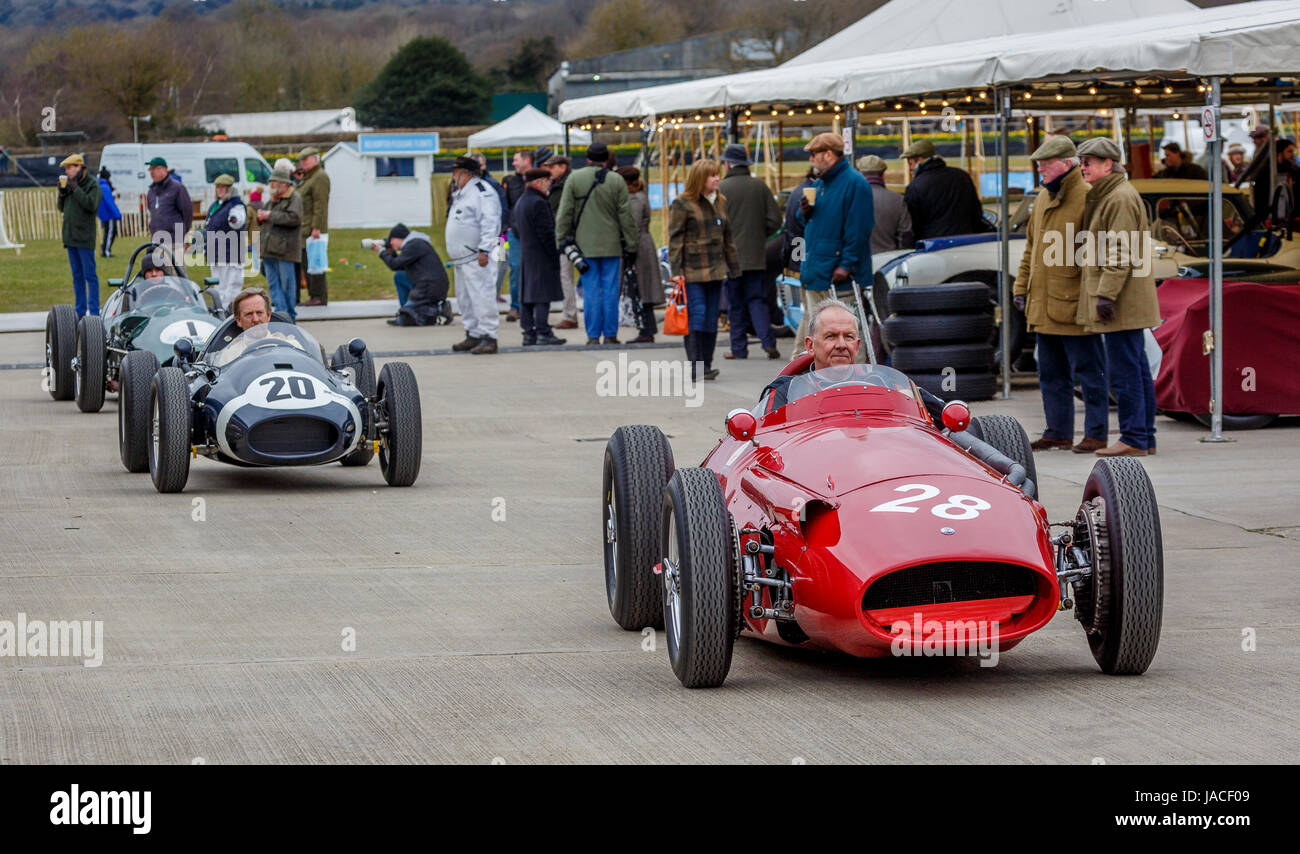 1954 Maserati 250F moves through the paddock for the Brooks Trophy race at Goodwood GRRC 74th Members Meeting, Sussex, UK. Stock Photo