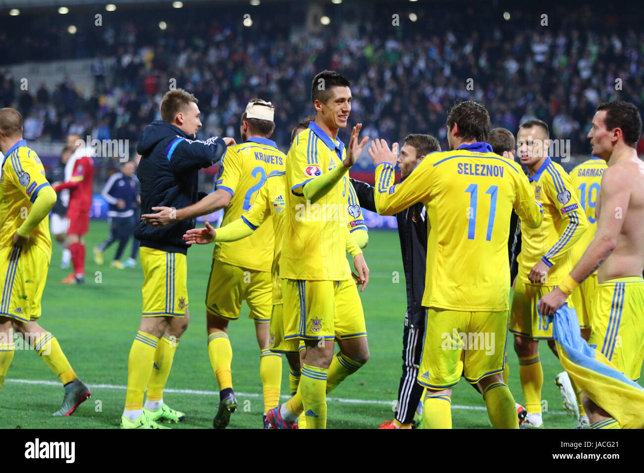 MARIBOR, SLOVENIA - NOVEMBER 17, 2015: Ukrainian footballers celebrate their win of UEFA EURO 2016 Play-off for Final Tournament after game against Sl Stock Photo
