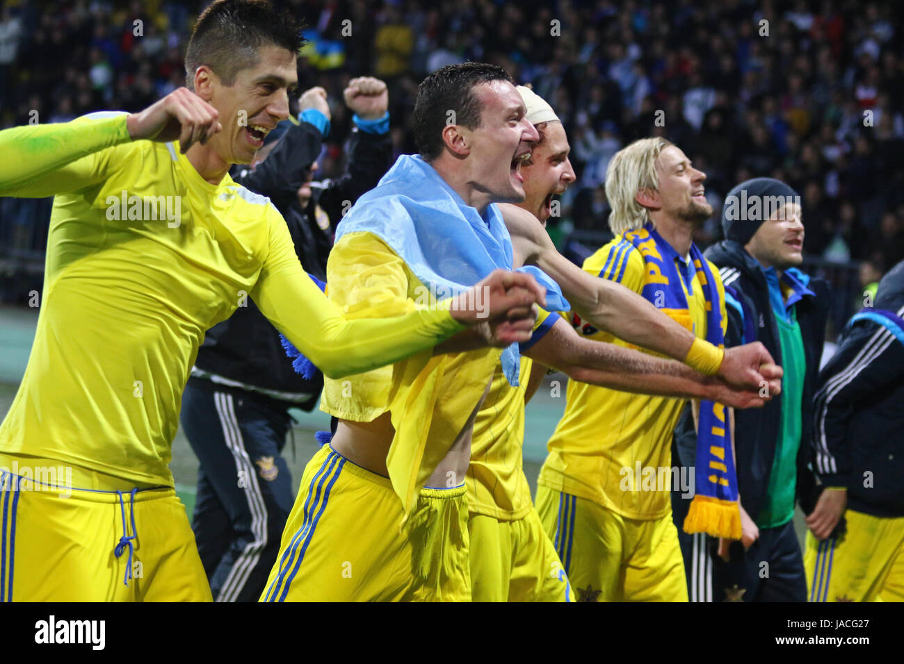 MARIBOR, SLOVENIA - NOVEMBER 17, 2015: Ukrainian footballers thank fans after won UEFA EURO 2016 Play-off for Final Tournament game against Slovenia a Stock Photo