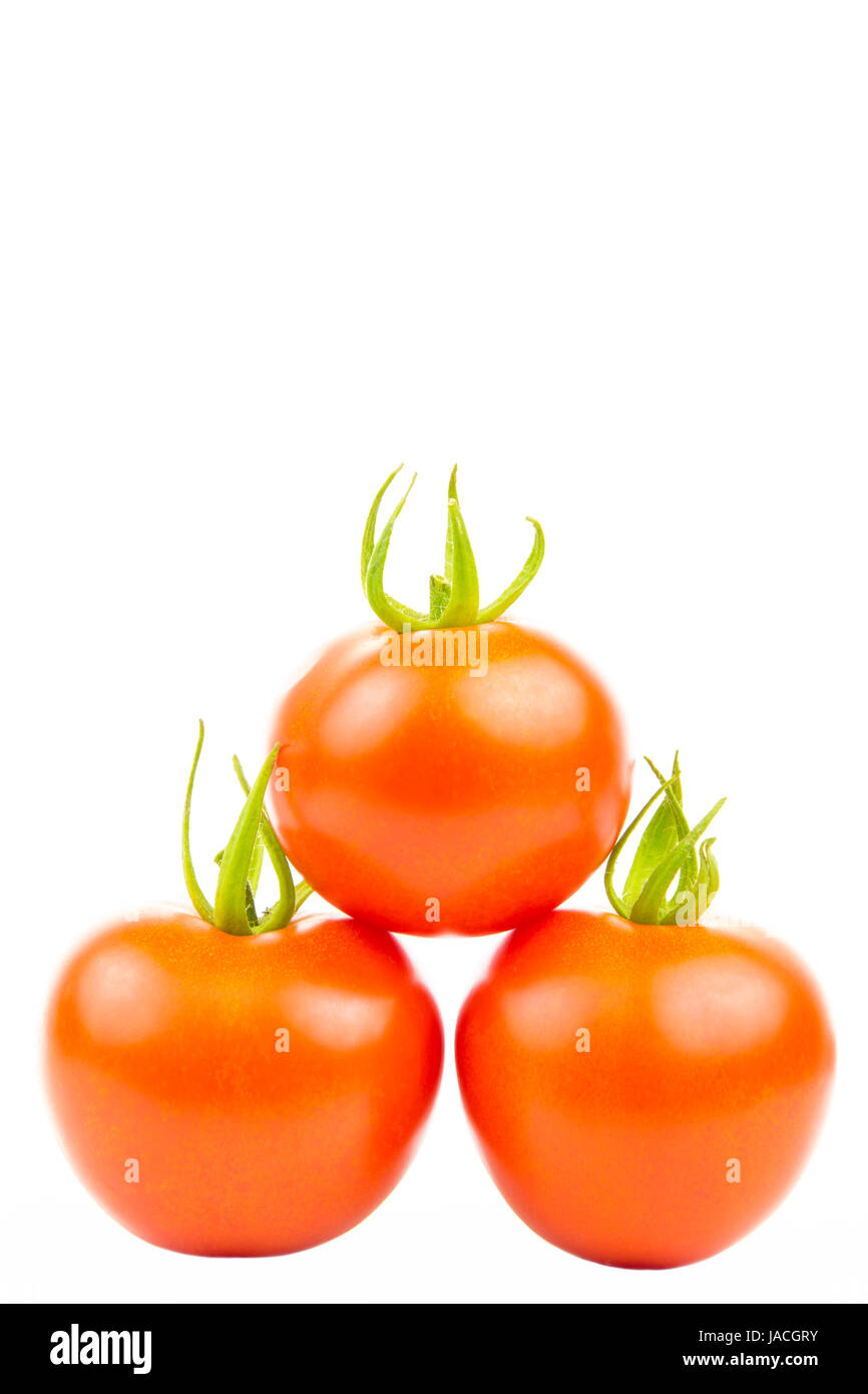Drei Tomaten in pyramidenform aufgestapelt Stock Photo