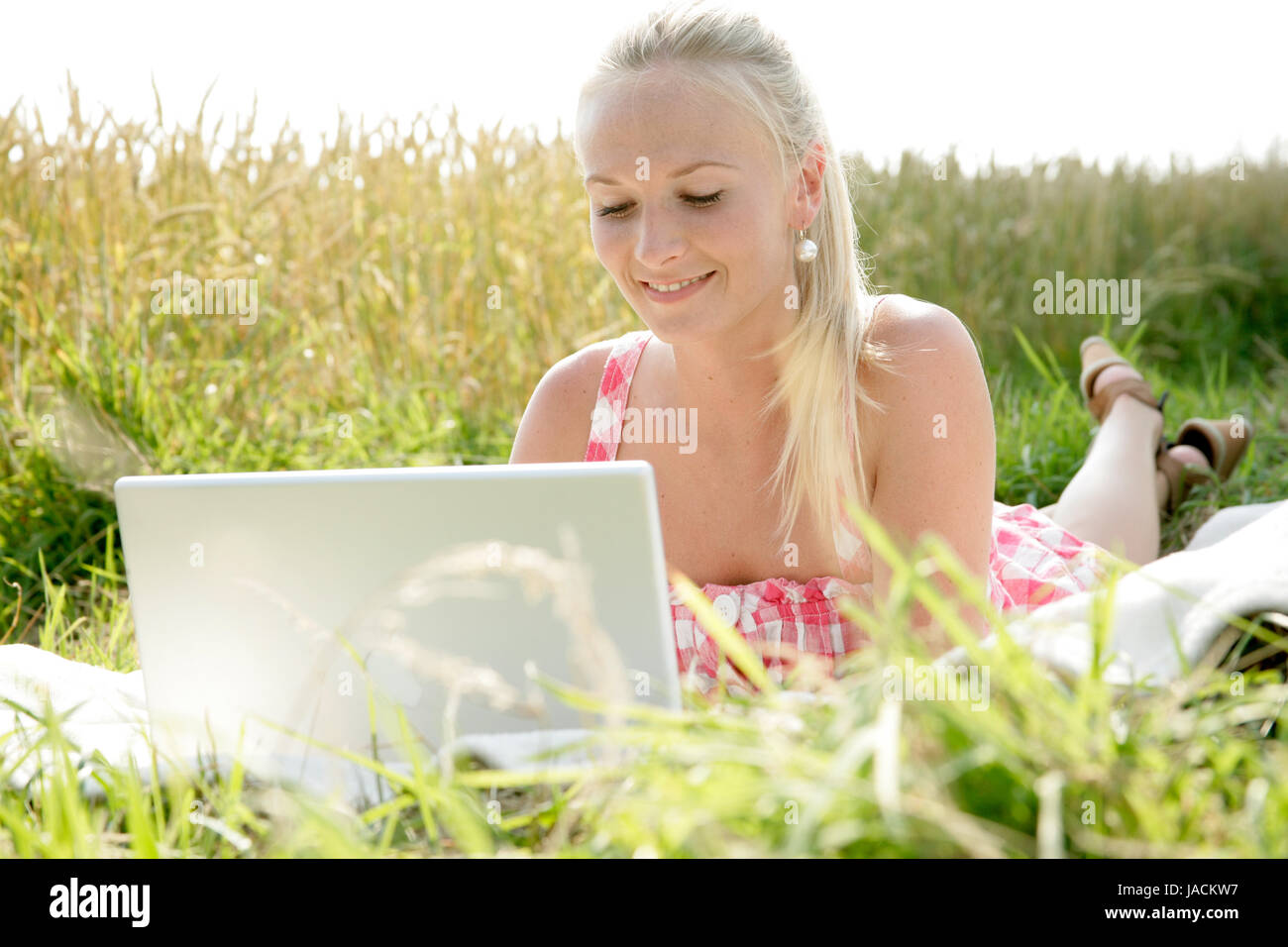 young woman with laptop Stock Photo - Alamy