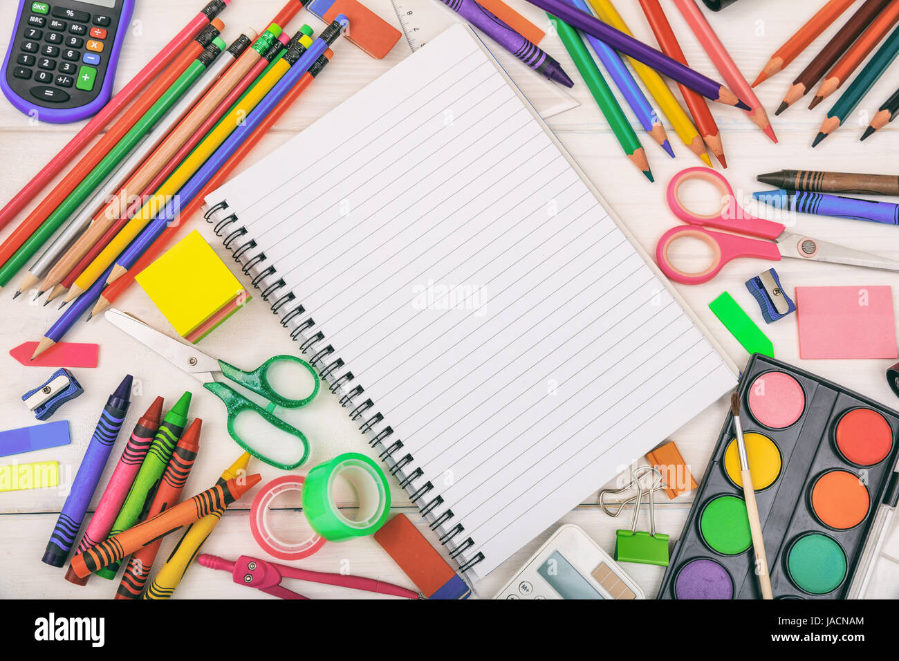 School supplies on white background - space for caption Stock Photo - Alamy