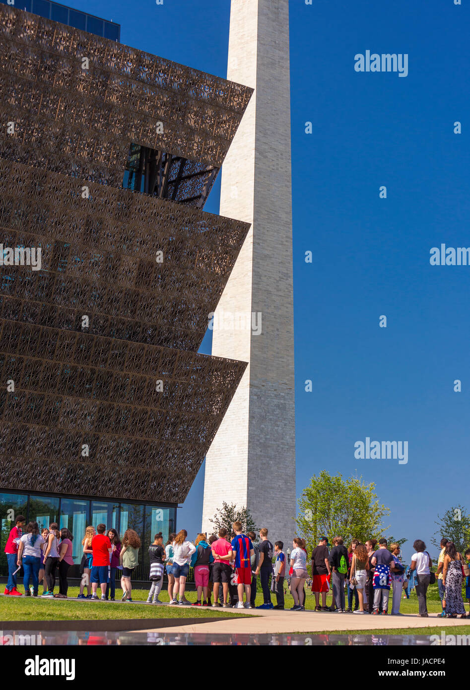 WASHINGTON, DC, USA - Smithsonian National Museum of African American History and Culture, and visitors waiting in line. Stock Photo