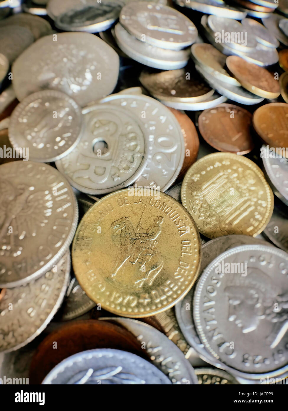 Cache of International Coins Stock Photo - Alamy