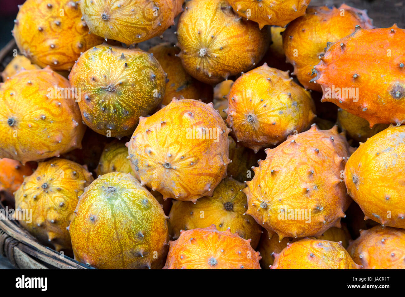Yangshuo, China. Kiwano Melons for Sale at a Sidewalk Fruit Stand Stock