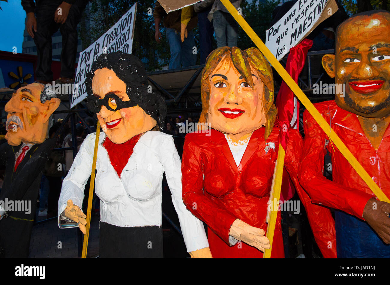 Quito, Ecuador - December 31, 2016: Traditional monigotes or stuffed dummies representing political figures, anime or famous cartoons, with a short description that will get burned to celebrate new year in Ecuador Stock Photo