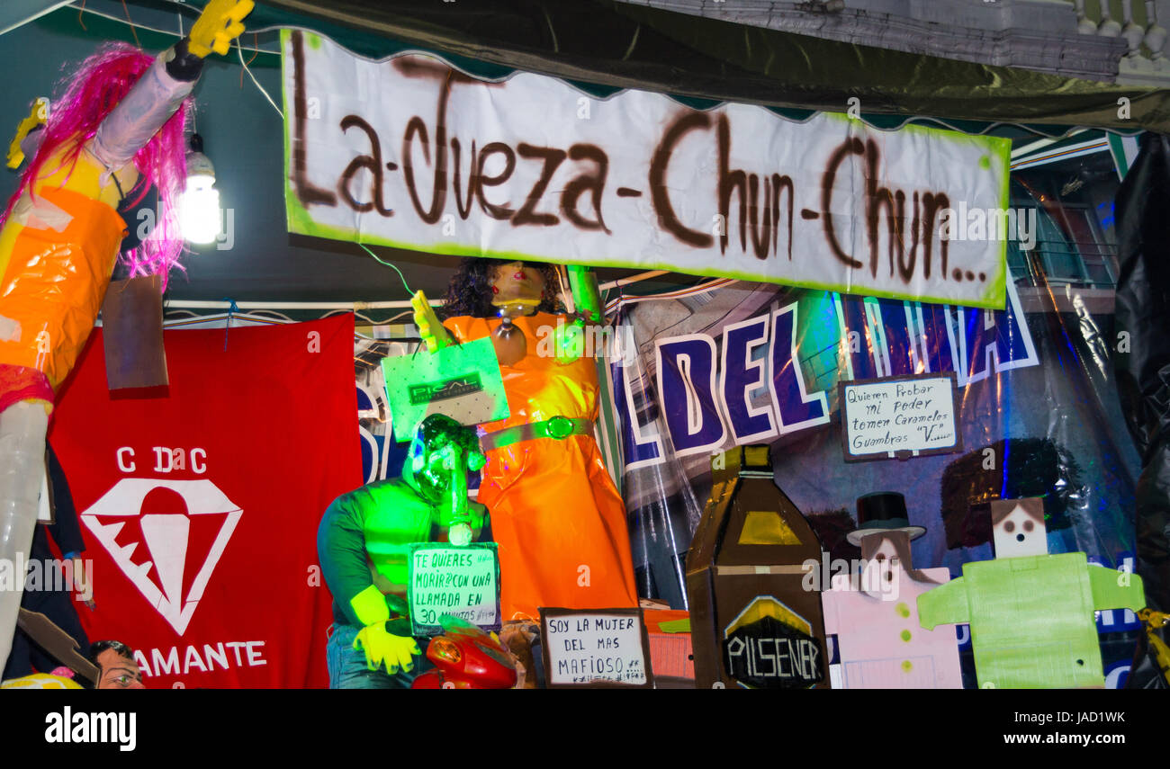 Quito, Ecuador - December 31, 2016: Traditional monigotes or stuffed dummies representing political figures, anime or famous cartoons, with a short description that will get burned to celebrate new year in Ecuador Stock Photo