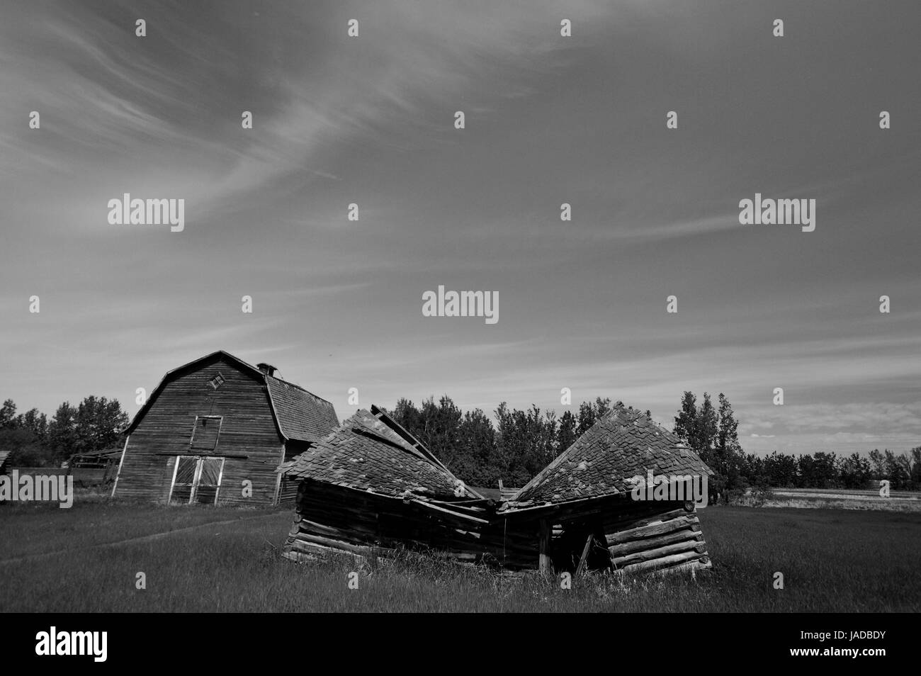 Abandoned Farm Houses and Barns on the Canadian Prairie. Stock Photo