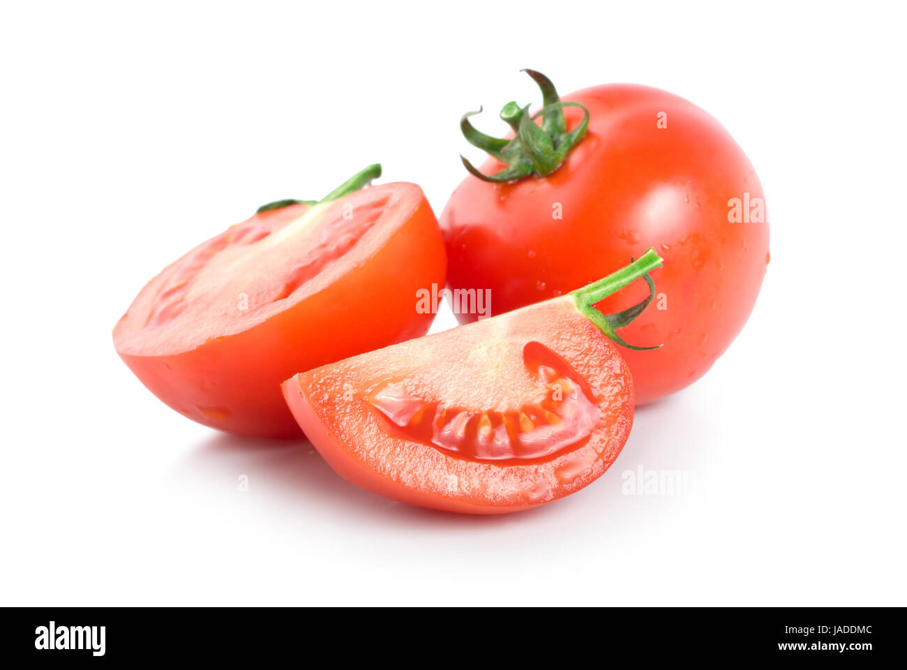 Three red tomatoes isolated on white background Stock Photo - Alamy
