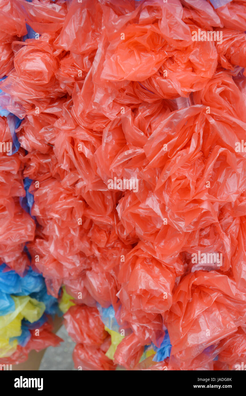 patterns of red used plastic bags background Stock Photo - Alamy